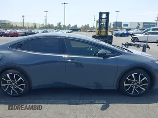 2024 Toyota Prius SE z VIN JTDACACU1R3033326, wystawiony jako IAAI lot #42174204 z przebiegiem 11 273 mil mil oraz . Historia ofert i sprzedaży dostępna na DreamBid. Obrazek 14.