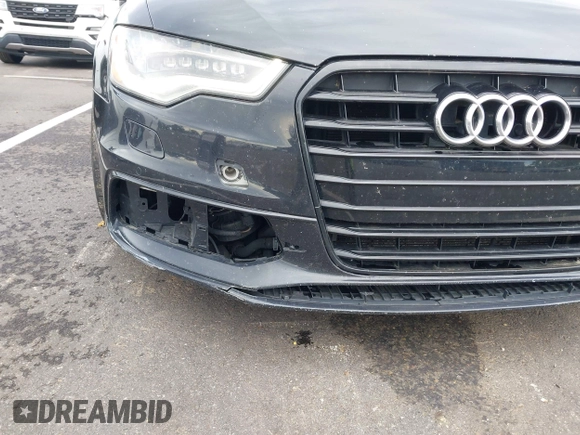 2014 Audi A6 Prestige with VIN WAUHGAFC6EN141698, listed as a IAAI auction lot 42330033 with 174,401 mi miles and . Bid and sale history available at DreamBid. Image 6.