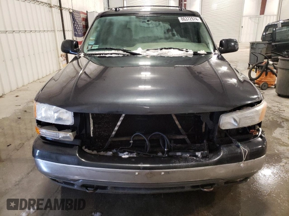 2004 GMC Yukon SLE with VIN 1GKEK13Z44J123899, listed as a Copart auction lot 86372974 with 201,093 mi miles and Salvage Title. Bid and sale history available at carsss.com. Image 5.