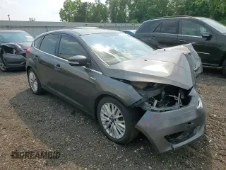 2018 Ford Focus Titanium z VIN 1FADP3N20JL271719, wystawiony jako Copart lot #60784755 z przebiegiem 116 118 mil mil oraz Szkoda całkowita • Salvage title. Historia ofert i sprzedaży dostępna na DreamBid. Obrazek 13.