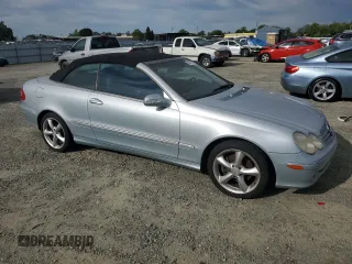 2005 Mercedes-Benz CLK 320 with VIN WDBTK65G65T052026, listed as a Copart auction lot 52526945 with 188,859 mi miles and Salvage Title. Bid and sale history available at DreamBid. Image 4.