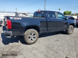 2019 Chevrolet Colorado 4WD Z71 with VIN 1GCGTDEN2K1110966, listed as a Copart auction lot 46719435 with 49,948 mi miles and Salvage Title. Bid and sale history available at carsss.com. Image 3.