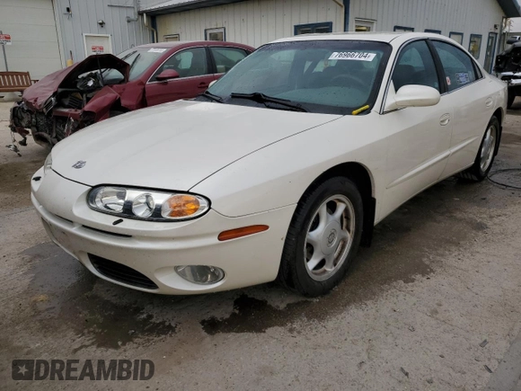 2003 Oldsmobile Aurora z VIN 1G3GS64C834100084, wystawiony jako Copart lot #76966704 z przebiegiem 70 263 mil mil oraz Szkody całkowita. Historia ofert i sprzedaży dostępna na DreamBid. Obrazek 1.