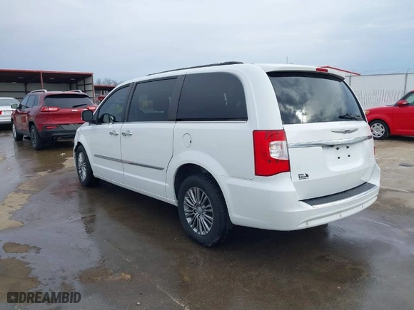 2014 Chrysler Town & Country Touring-L 30th Anniversary with VIN 2C4RC1CG8ER193069, listed as a IAAI auction lot 41713157 with 141,059 mi miles. Bid and sale history available at carsss.com. Image 3.