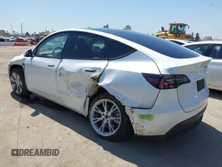 2023 Tesla Model Y Long Range z VIN 7SAYGDEE5PA104635, wystawiony jako IAAI lot #41989014 z przebiegiem 15 347 mil mil oraz . Historia ofert i sprzedaży dostępna na DreamBid. Obrazek 3.