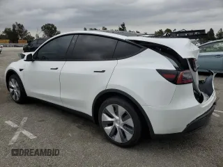 2024 Tesla Model Y Long Range with VIN 7SAYGDEE8RF088808, listed as a Copart auction lot 50406865 with 8,150 mi miles and Salvage title. Bid and sale history available at DreamBid. Image 2.