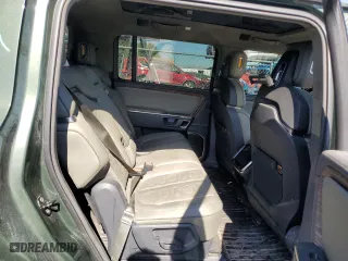 2023 Rivian R1S Launch Edition with VIN 7PDSGABL3PN000033, listed as a Copart auction lot 60131444 with 30,066 mi miles and Salvage Title. Bid and sale history available at carsss.com. Image 10.
