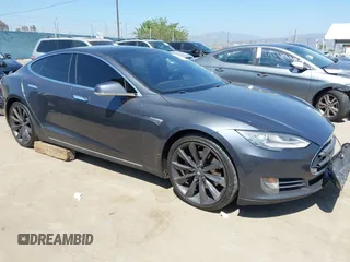 2014 Tesla Model S 60 with VIN 5YJSA1H15EFP65285, listed as a IAAI auction lot 42297394 with 178,866 mi miles and . Bid and sale history available at DreamBid. Image 1.