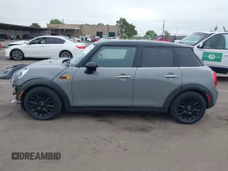 2015 MINI Hardtop 4 Door with VIN WMWXS5C52FT829699, listed as a IAAI auction lot 42078187 with 59,641 mi miles and . Bid and sale history available at DreamBid. Image 15.
