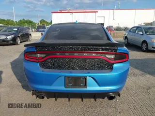 2015 Dodge Charger SXT with VIN 2C3CDXHG1FH848019, listed as a IAAI auction lot 42124399 with 175,247 mi miles and . Bid and sale history available at DreamBid. Image 15.