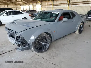 2023 Dodge Challenger R/T Scat Pack Widebody z VIN 2C3CDZFJ8PH693769, wystawiony jako Copart lot #50825455 z przebiegiem 19 059 mil mil oraz Szkoda całkowita • Salvage title. Historia ofert i sprzedaży dostępna na DreamBid. Obrazek 1.