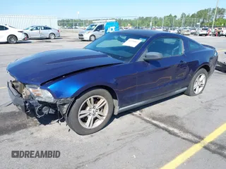 2012 Ford Mustang V6 Premium with VIN 1ZVBP8AM5C5244459, listed as a IAAI auction lot 41920863 with 127,034 mi miles. Bid and sale history available at carsss.com. Image 2.