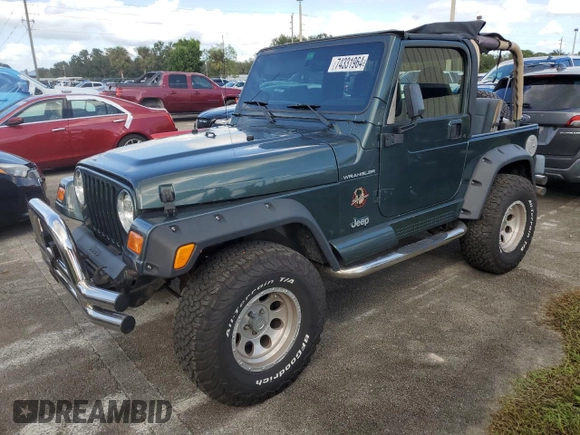 2002 Jeep Wrangler Sahara with VIN 1J4FA59S12P766719, listed as a Copart auction lot 74331964 with 128,881 mi miles and Non Repairable. Bid and sale history available at carsss.com. Image 1.