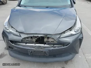 2019 Toyota Prius L Eco with VIN JTDKARFU9K3075219, listed as a IAAI auction lot 42113323 with 218,986 mi miles. Bid and sale history available at carsss.com. Image 6.
