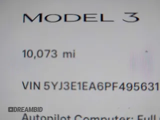 2023 Tesla Model 3 with VIN 5YJ3E1EA6PF495631, listed as a IAAI auction lot 41568118 with 10,073 mi miles and . Bid and sale history available at DreamBid. Image 16.
