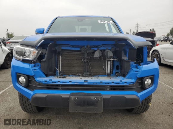 2021 Toyota Tacoma SR with VIN 3TMCZ5AN1MM426566, listed as a Copart auction lot 59613315 with 28,903 mi miles and Salvage title. Bid and sale history available at DreamBid. Image 5.