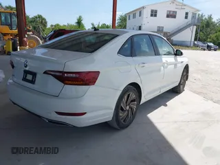 2019 Volkswagen Jetta SEL Premium z VIN 3VWGB7BU6KM168451, wystawiony jako IAAI lot #42090183 z przebiegiem 75 851 mil mil oraz . Historia ofert i sprzedaży dostępna na DreamBid. Obrazek 4.