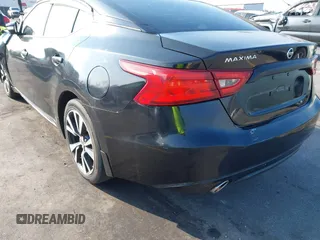 2016 Nissan Maxima SL z VIN 1N4AA6AP1GC383512, wystawiony jako IAAI lot #41490666 z przebiegiem 110 235 mil mil oraz . Historia ofert i sprzedaży dostępna na DreamBid. Obrazek 20.