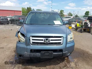2007 Honda Pilot EX with VIN 5FNYF18447B008645, listed as a IAAI auction lot 42079535 with 233,187 mi miles. Bid and sale history available at carsss.com. Image 12.