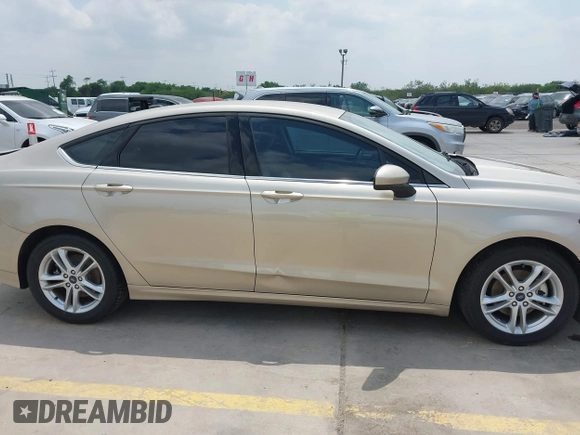 2018 Ford Fusion SE z VIN 3FA6P0H75JR176394, wystawiony jako IAAI lot #42169780 z przebiegiem 65 617 mil mil oraz . Historia ofert i sprzedaży dostępna na DreamBid. Obrazek 13.