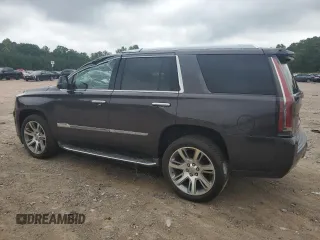 2015 Cadillac Escalade Luxury z VIN 1GYS4MKJ0FR630707, wystawiony jako Copart lot #59679925 z przebiegiem 140 615 mil mil oraz Szkoda całkowita • Salvage title. Historia ofert i sprzedaży dostępna na DreamBid. Obrazek 2.