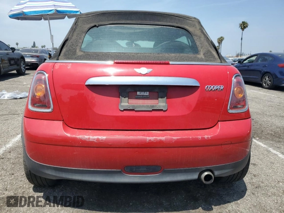 2010 MINI Convertible с VIN WMWMR3C59ATU97966, выставлен на аукционе Copart как лот 59870035 с пробегом 124 132 миль миль и Списание • Salvage title. История ставок и продаж доступна на DreamBid. Изображение 6.
