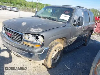 2001 GMC Yukon SLT with VIN 1GKEK13T81J177892, listed as a IAAI auction lot 41924669 with 198,561 mi miles. Bid and sale history available at carsss.com. Image 2.