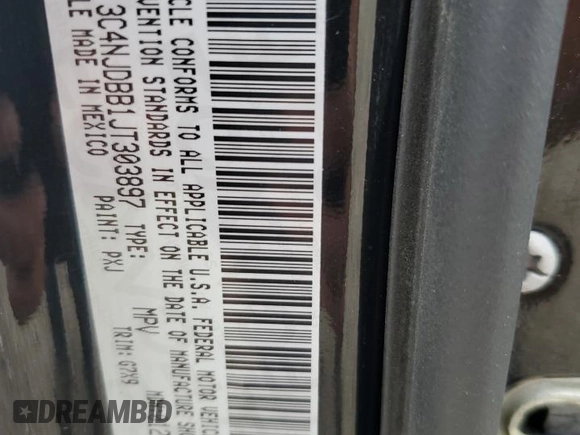 2018 Jeep Compass Latitude with VIN 3C4NJDBB1JT303897, listed as a Copart auction lot 57625015 with Not provided miles and Salvage title. Bid and sale history available at DreamBid. Image 13.