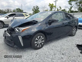 2020 Toyota Prius LE z VIN JTDL9RFU1L3022075, wystawiony jako Copart lot #56400245 z przebiegiem 52 512 mil mil oraz Nie do naprawy • Non repairable. Historia ofert i sprzedaży dostępna na DreamBid. Obrazek 1.