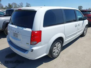 2016 Dodge Grand Caravan SE with VIN 2C4RDGBG2GR311654, listed as a IAAI auction lot 42056032 with 185,330 mi miles and . Bid and sale history available at DreamBid. Image 4.