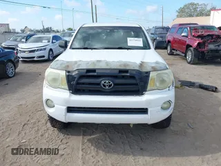 2005 Toyota Tacoma PreRunner with VIN 3TMKU72N65M001821, listed as a IAAI auction lot 41579911 with 301,297 mi miles. Bid and sale history available at carsss.com. Image 6.