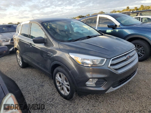 2017 Ford Escape SE z VIN 1FMCU0GDXHUE91333, wystawiony jako Copart lot #82061644 z przebiegiem Nie podano mil oraz Nie do naprawy • Non repairable. Historia ofert i sprzedaży dostępna na DreamBid. Obrazek 4.