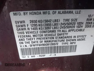 2016 Honda Pilot Touring with VIN 5FNYF6H90GB126572, listed as a IAAI auction lot 41872113 with 94,318 mi miles. Bid and sale history available at carsss.com. Image 9.