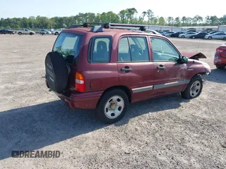 2003 Suzuki Vitara z VIN 2S3TE52V236103499, wystawiony jako IAAI lot #42285161 z przebiegiem 97 533 mil mil oraz . Historia ofert i sprzedaży dostępna na DreamBid. Obrazek 4.