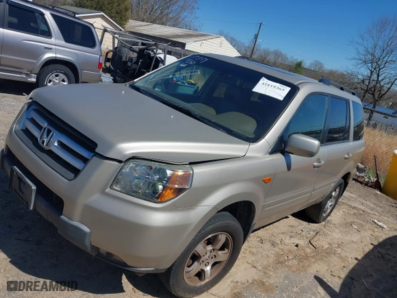 2006 Honda Pilot EX-L with RES with VIN 5FNYF28626B016118, listed as a IAAI auction lot 41819365 with 314,954 mi miles. Bid and sale history available at carsss.com. Image 2.