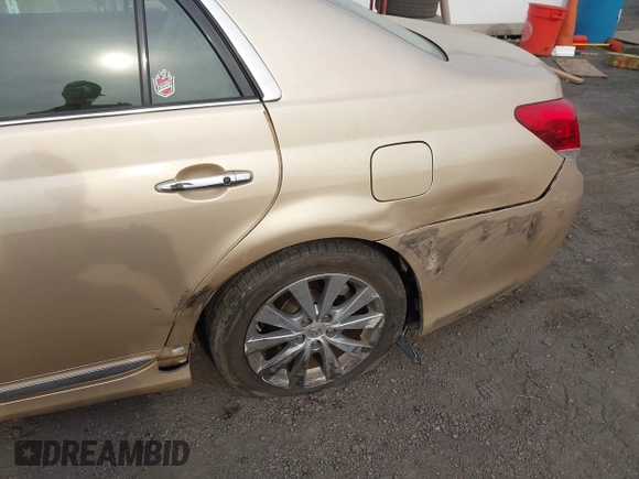 2011 Toyota Avalon with VIN 4T1BK3DB5BU414687, listed as a IAAI auction lot 42103830 with 130,045 mi miles and . Bid and sale history available at carsss.com. Image 6.