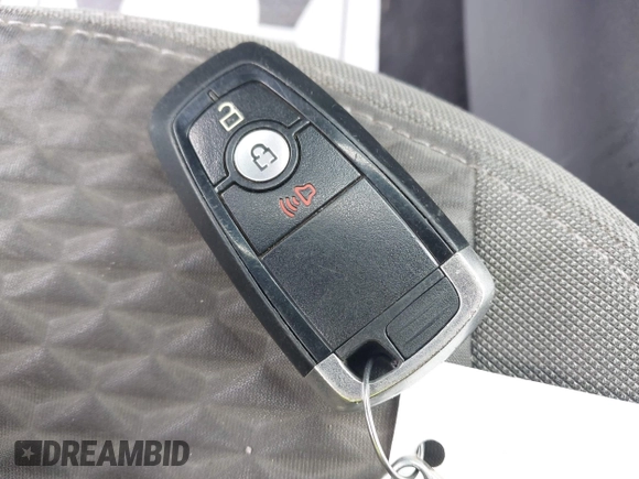 2021 Ford Escape SE z VIN 1FMCU0G62MUA94307, wystawiony jako IAAI lot #42018728 z przebiegiem 142 662 mil mil oraz . Historia ofert i sprzedaży dostępna na DreamBid. Obrazek 11.