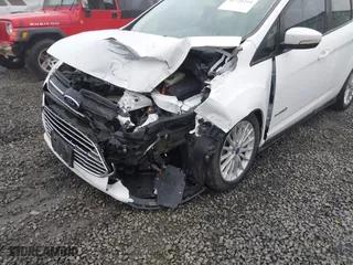 2013 Ford C-Max Hybrid SE with VIN 1FADP5AU3DL529867, listed as a IAAI auction lot 41725293 with 95,071 mi miles. Bid and sale history available at carsss.com. Image 6.