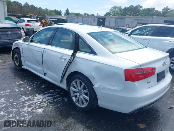 2014 Audi A6 Prestige with VIN WAUHGAFCXEN091050, listed as a IAAI auction lot 42524560 with 169,575 mi miles and . Bid and sale history available at DreamBid. Image 3.