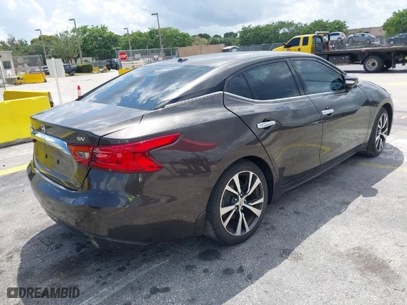 2016 Nissan Maxima 3.5 SR with VIN 1N4AA6AP9GC405420, listed as a IAAI auction lot 41933739 with 59,680 mi miles. Bid and sale history available at carsss.com. Image 4.