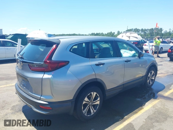 2020 Honda CR-V LX with VIN 7FARW1H26LE002413, listed as a IAAI auction lot 42318905 with 63,698 mi miles and . Bid and sale history available at DreamBid. Image 4.