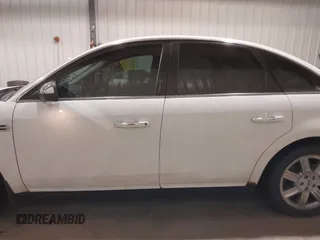 2008 Ford Taurus Limited with VIN 1FAHP25W28G173633, listed as a IAAI auction lot 40994885 with 133,974 mi miles. Bid and sale history available at carsss.com. Image 14.