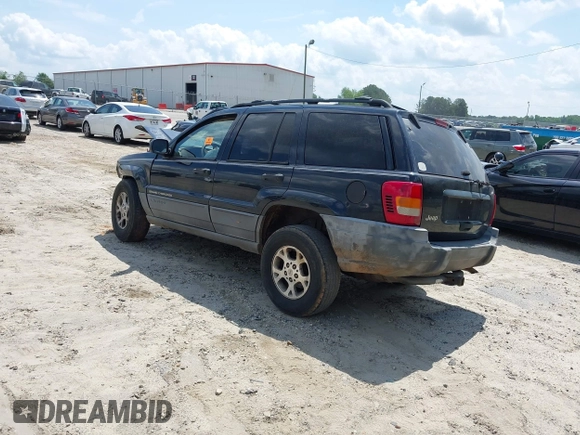 2000 Jeep Grand Cherokee Laredo with VIN 1J4G248SXYC365442, listed as a IAAI auction lot 42285521 with Not provided miles and . Bid and sale history available at DreamBid. Image 3.