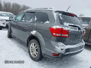 2013 Dodge Journey SXT with VIN 3C4PDCBGXDT727072, listed as a IAAI auction lot 41488809 with 79,380 mi miles and . Bid and sale history available at carsss.com. Image 3.