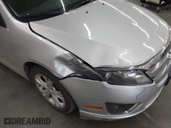 2012 Ford Fusion SE with VIN 3FAHP0HAXCR339239, listed as a IAAI auction lot 42622696 with 168,153 mi miles and . Bid and sale history available at DreamBid. Image 6.