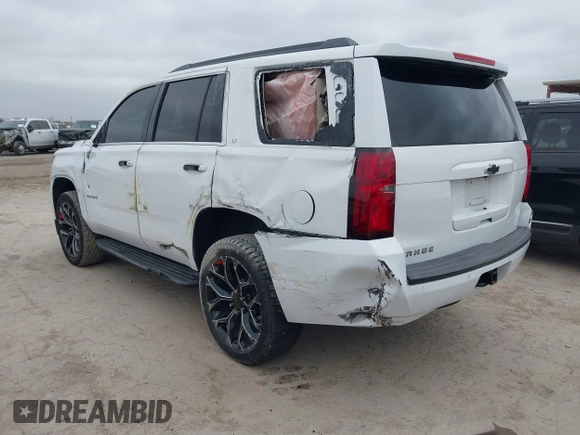 2015 Chevrolet Tahoe LT with VIN 1GNSCBKC4FR530776, listed as a IAAI auction lot 41754350 with 174,694 mi miles and . Bid and sale history available at DreamBid. Image 3.