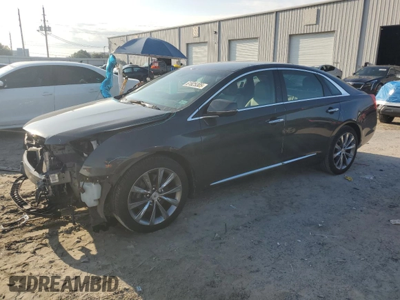 2013 Cadillac XTS Luxury with VIN 2G61P5S32D9235227, listed as a Copart auction lot 61825305 with 59,853 mi miles and Salvage title. Bid and sale history available at DreamBid. Image 1.