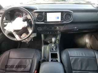 2020 Toyota Tacoma SR5 with VIN 3TMDZ5BN6LM097302, listed as a Copart auction lot 57503895 with 77,212 mi miles and Salvage title. Bid and sale history available at DreamBid. Image 8.