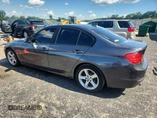 2013 BMW 3 Series 320i xDrive with VIN WBA3C3C51DF980707, listed as a Copart auction lot 63655825 with 148,487 mi miles and Clean title. Bid and sale history available at DreamBid. Image 2.