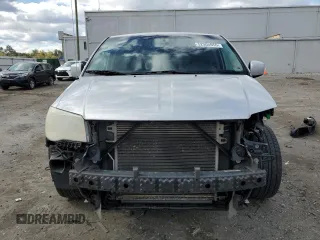 2012 Dodge Grand Caravan SXT with VIN 2C4RDGCG5CR327937, listed as a Copart auction lot 52905955 with 168,382 mi miles and Salvage Title. Bid and sale history available at DreamBid. Image 5.
